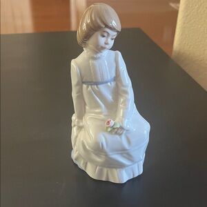 Porcelain Girl Figurine with Rose Accents